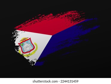 Abstract creative patriotic hand painted stain brush flag of Saint Martin on black background
