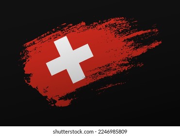 Resumen creativo patriótico con la mano pintada bandera de Suiza sobre fondo negro