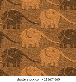 Abstract decorative elephants carving on textured leather background. Seamless pattern. Vector.