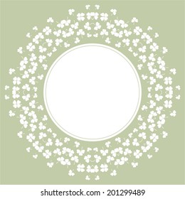 Abstract decorative flower background with clover, shamrocks and place for your text 
