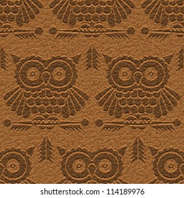 Abstract decorative owls carving on textured leather background. Seamless pattern. Vector.