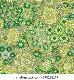Abstract decorative seamless pattern with hand drawn green yellow floral elements
