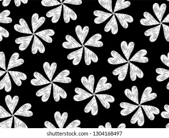 Abstract decorative vector seamless pattern with chalk drawn handwritten ornamental flowers
