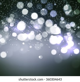 Abstract defocused christmas background. Festive elegant abstract background with bokeh  lights 