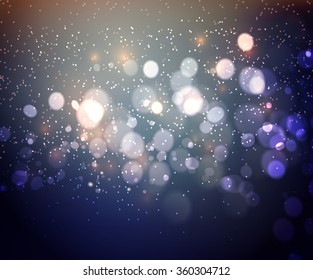Abstract defocused christmas background. Festive elegant blue abstract background with bokeh  lights 