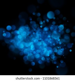 Abstract defocused circular blue bokeh on dark background. EPS 10