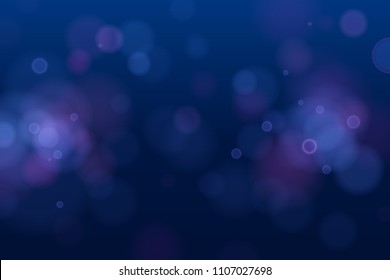 Abstract defocused circular blue bokeh lights on dark background. EPS 10