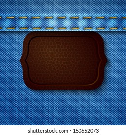 Abstract denim background with leather tag