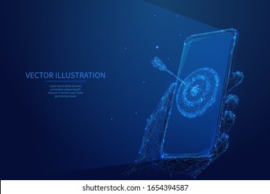 Abstract digital marketing concept. Isolated blue polygonal target on smartphone screen in a hand. Low poly wireframe digital vector illustration. Polygons, particles, lines and connected dots.