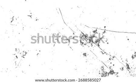 Abstract distressed gray grunge texture with cracks and speckles on a white background
