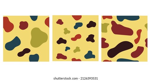 abstract doodle in blue, yellow, red and brown on yellow background set seamless pattern. Suitable for fabric tile, background, backdrop