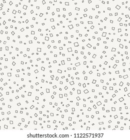 Abstract doodle pattern. Confetti hand drawn vector seamless background. Monochromatic simple repeating print. 