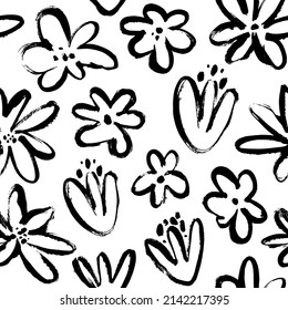 Abstract doodle pattern with floral motif. Herbal and daisy ink illustration. Vector doodle seamless pattern. Dry brush style floral motives. Black paint illustration with chamomiles and wild plants