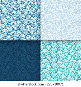 Abstract doodle scale seamless patterns set. Vector illustration