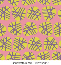 Abstract dot shapes vector seamless pattern. Purple and lime dots on a pink background. Great for fabric prints, paper projects, and packaging.