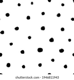Abstract dots monochrome seamless pattern. Hand drawn Polka dot grunge brush black and white ornament.