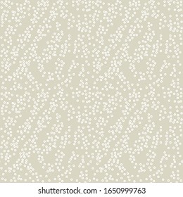 puntos abstractos en fondo beige, patrón vectorial transparente