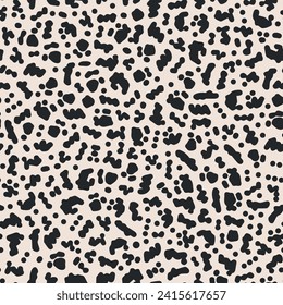 Abstract dots seamless repeat pattern. Random placed, vector animal skin aop, all over surface print on beige background.