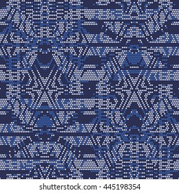 Abstract dotted ornament. Seamless pattern.