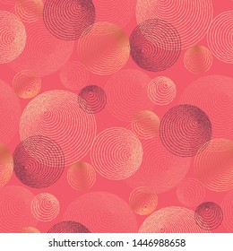 Abstract dotted round lines seamless pattern. Boho vibes  vector element for textile, surface design, backdrop. Disk and ring tribal graphic shapes in gold and coral color.
