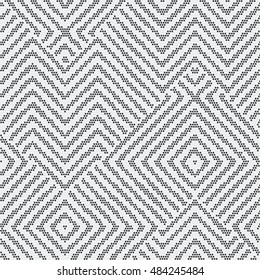 Abstract dotted textured geometric motif. Seamless pattern.