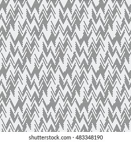 Abstract dotted zigzag motif textured background. Seamless pattern.