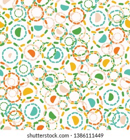 Abstract dotty retro circles. Vector pattern seamless background. Hand drawn textured style. Polka dot tossed graphic illustration. Trendy vintage home decor, kid fashion print, retro art wallpaper.