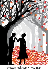 abstract dry tree, autumn leaf background with boy kissing on girl hand