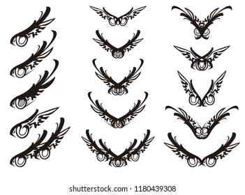 Abstract eagle eye and tribal wings symbols. Tribal set of ornate eagle wings and a laconic eye in the form of an eagle, similar to an emblem on a white background for your design