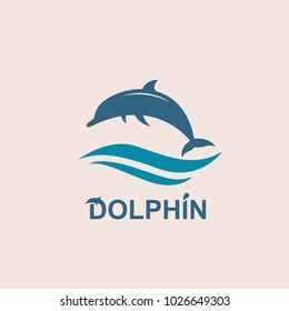 abstract emblem of jumping dolphin and sea wave