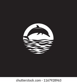 abstract emblem of jumping dolphin, sun and sea wave