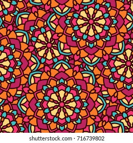 Abstract endless backdrop. Round multicolor texture in orange, blue and yellow colors. Mandala seamless background