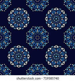 Abstract endless backdrop. Round multicolor texture in blue and white colors. Mandala seamless background