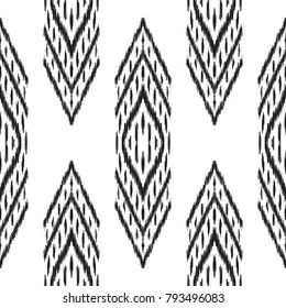 Abstract ethnic background. Black and white Ikat seamless pattern. A design may be used for fashion textile, fabric, wallpaper, card or wrapping paper. Vector illustration.