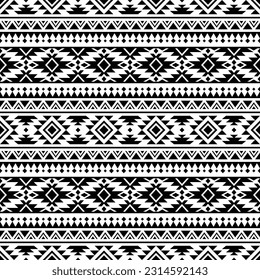 Abstract ethnic geometric background illustration design. Seamless pattern of Aztec tribal. Black and white colors. Design for textile, fabric, clothing, curtain, rug, ornament, wallpaper, wrapping.