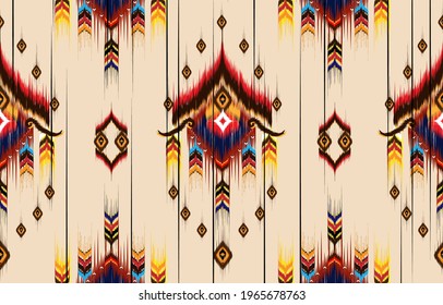 Abstract ethnic geometric pattern design for background or wallpaper,Ikat geometric folklore ornament. Tribal ethnic vector texture. Seamless striped pattern in Aztec style. Figure tribal embroidery. 