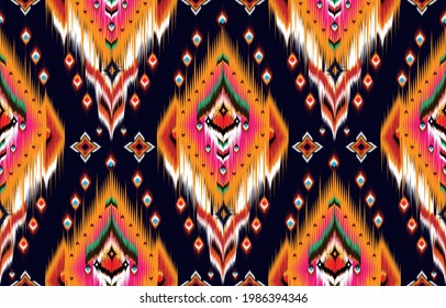 Abstract ethnic geometric pattern design for background or wallpaper,Ikat geometric folklore ornament. Tribal ethnic vector texture. Seamless striped pattern in Aztec style. Figure tribal embroidery.