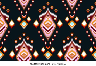 Abstract ethnic geometric pattern design for background or wallpaper,Ikat geometric folklore ornament. Tribal ethnic vector texture. Seamless striped pattern in Aztec style. Figure tribal embroidery.