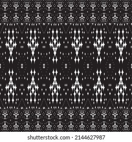 Abstract ethnic geometric pattern design for background or wallpaper,Ikat geometric folklore ornament. Tribal ethnic vector texture. Seamless striped pattern in Aztec style. Figure tribal embroidery.