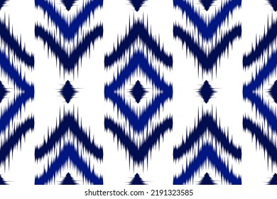 Abstract ethnic ikat art. Seamless pattern in tribal. Aztec geometric ornament print. Design for background, wallpaper, illustration, fabric, clothing, carpet, textile, batik, embroidery.