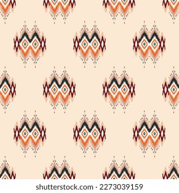 Abstract Ethnic ikat art. Seamless pattern in tribal, folk embroidery, and Mexican style. Aztec geometric art ornament print.Design for carpet, cover.wallpaper, wrapping, fabric, clothing