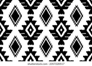 Abstract Ethnic ikat black white art. Seamless pattern in tribal, folk embroidery, and Mexican style. Aztec geometric art ornament print.Design for carpet, covers.wallpaper, wrapping, fabric