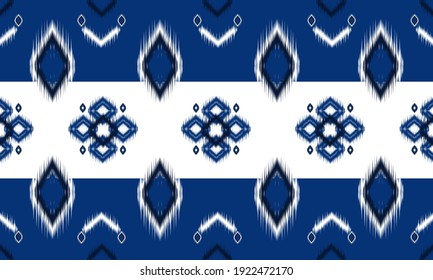 Abstract ethnic ikat chevron pattern background. 
,carpet,wallpaper,clothing,wrapping,Batik,fabric,Vector illustration.embroidery style.