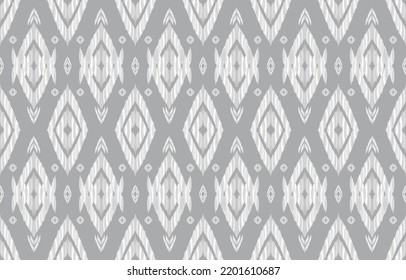 Abstract ethnic ikat geometric seamless pattern. Aztec native tribal fabric on silver grey background. Vector design for texture, textile, clothing, wallpaper, carpet, embroidery, illustration print.