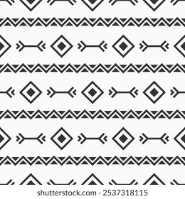 Abstract ethnic seamless geometric pattern. Tribal and ethnic motif seamless background with rhombuses, triangles, geometric shapes. Black and white vector background. Design for wrapping, fabric.