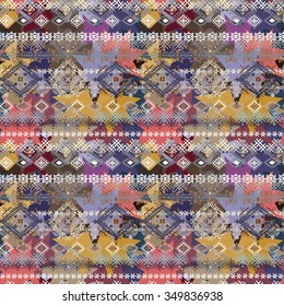 Abstract ethnic seamless pattern. Tribal art boho print, paint spots. Ethno grunge texture, camouflage