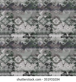 Abstract ethnic seamless pattern. Tribal art boho print, paint spots. Ethno grunge texture, camouflage