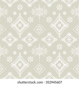 Abstract ethnic seamless pattern. Tribal art print with geometric shapes, flowers. Background texture, wallpaper, wrapping