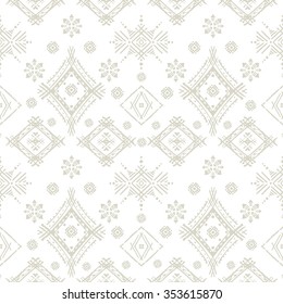 Abstract ethnic seamless pattern. Tribal art print with geometric shapes, flowers. Background texture, wallpaper, wrapping