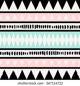 Abstract ethnic seamless repeat pattern in black, white, blue and pastel pink. Modern and stylish abstract design poster, cover, card design.